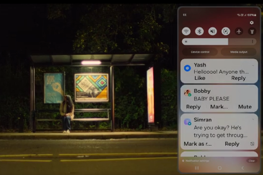 A person sits alone at a dimly lit bus stop at night, head down. Overlaying the image is a smartphone screen showing message notifications from Yash (“Hellooo! Anyone th…”), Bobby (“BABY PLEASE”), and Simran (“Are you okay? He’s trying to get through…”).