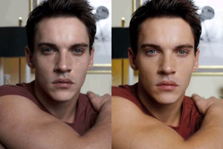 Side-by-side photos of a man with dark hair and blue eyes, wearing a red shirt and resting his arms on a surface. The left image shows natural skin with visible texture and slight under-eye shadows, while the right image features a retouched version with smoother skin, even complexion, and brighter eyes.
