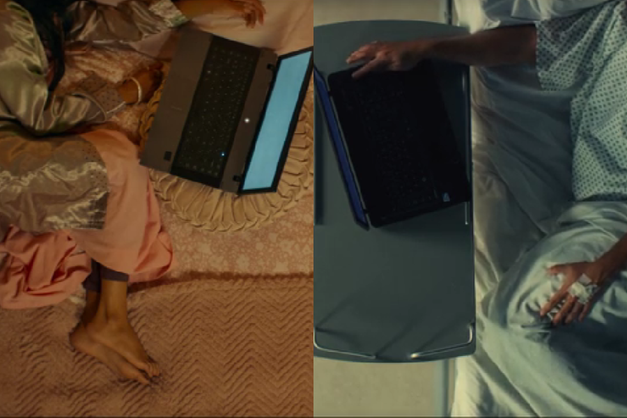 Split-screen image of two people in different settings using laptops — on the left, a woman in satin pajamas lies on a pink bed with her laptop beside her; on the right, a man in a hospital gown rests in bed with a laptop on a tray, an IV attached to his hand, suggesting they are connected digitally despite physical distance.